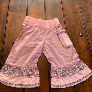 Adorable purple capris with ruffle bottoms